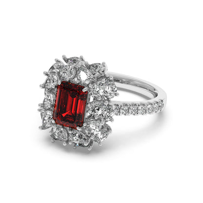14k white gold ring with a 2.50CT red ruby and halo diamonds, featuring a diamond-adorned band for a luxurious look