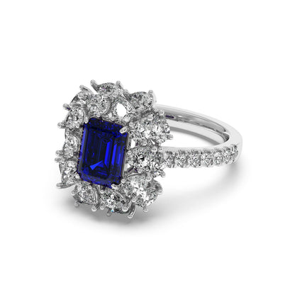 14k white gold ring with a 2.50CT blue sapphire and clear diamonds in a rectangular halo design, elegant and luxurious