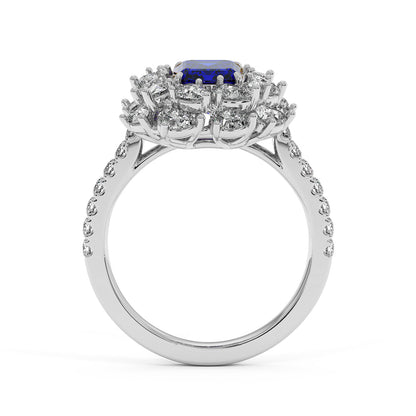14k white gold ring with a 2.50CT blue sapphire and diamond halo, featuring diamond accents on the band