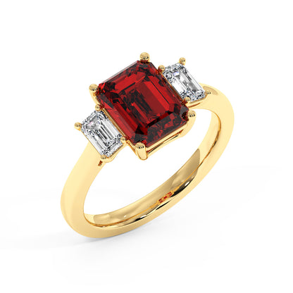 Gold 3.5 carat ruby ring with large red rectangular gemstone and two smaller white rectangular stones. Elegant design.
