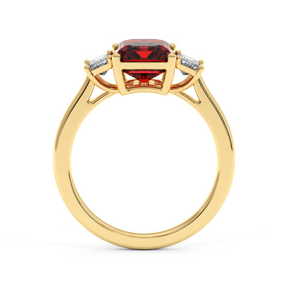 Gold 3.5 carat red ruby ring with large gemstone center and two smaller white gemstones. Elegant and luxurious design.