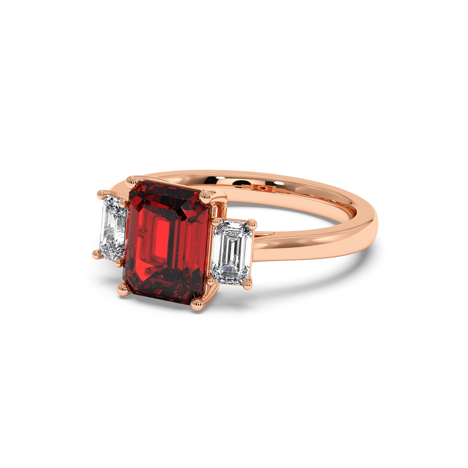 Rose gold 3.5 carat ruby ring with red emerald-cut gemstone and two smaller rectangular stones.