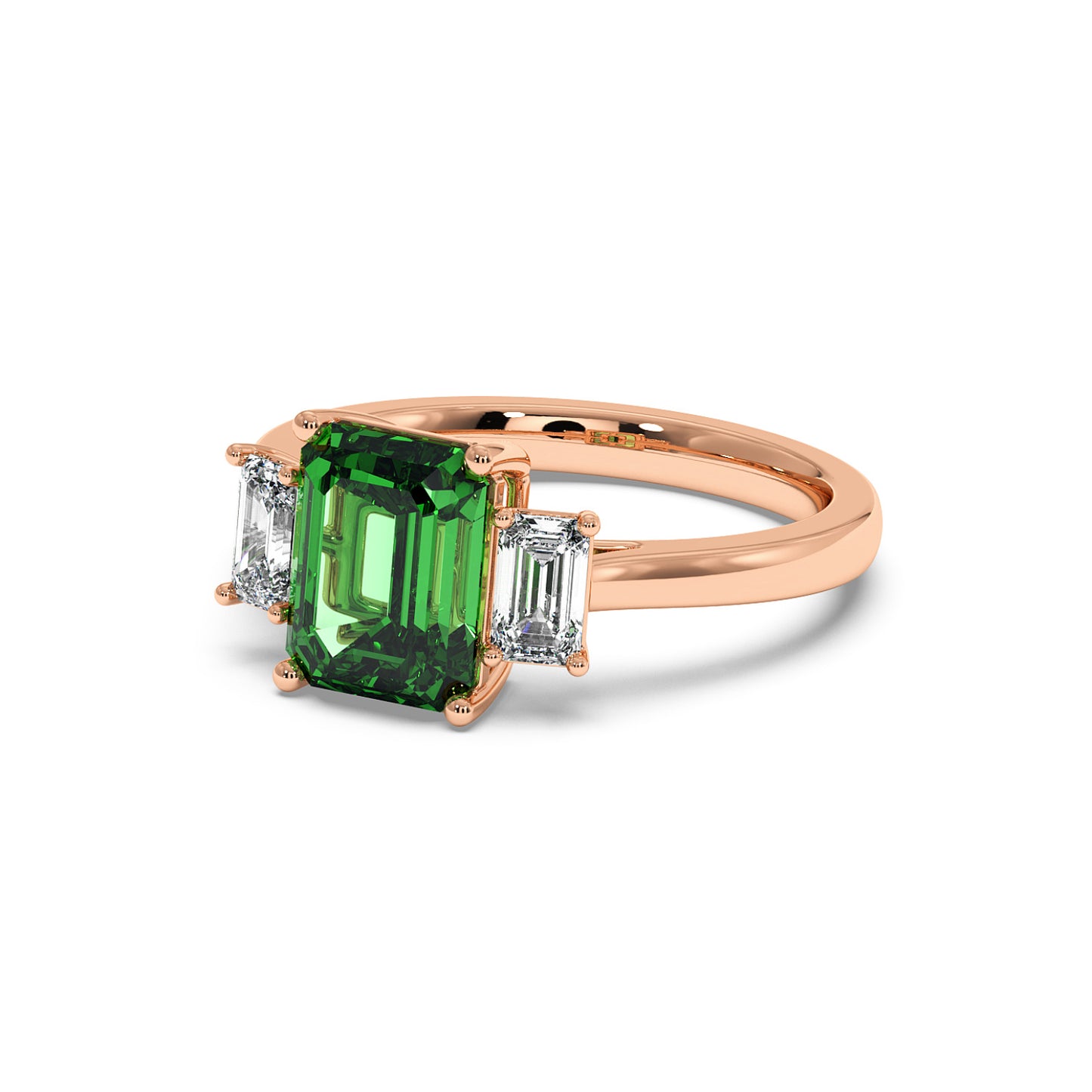 Elegant rose gold 3.5 carat emerald cut ring with green gemstone and two smaller clear diamonds.