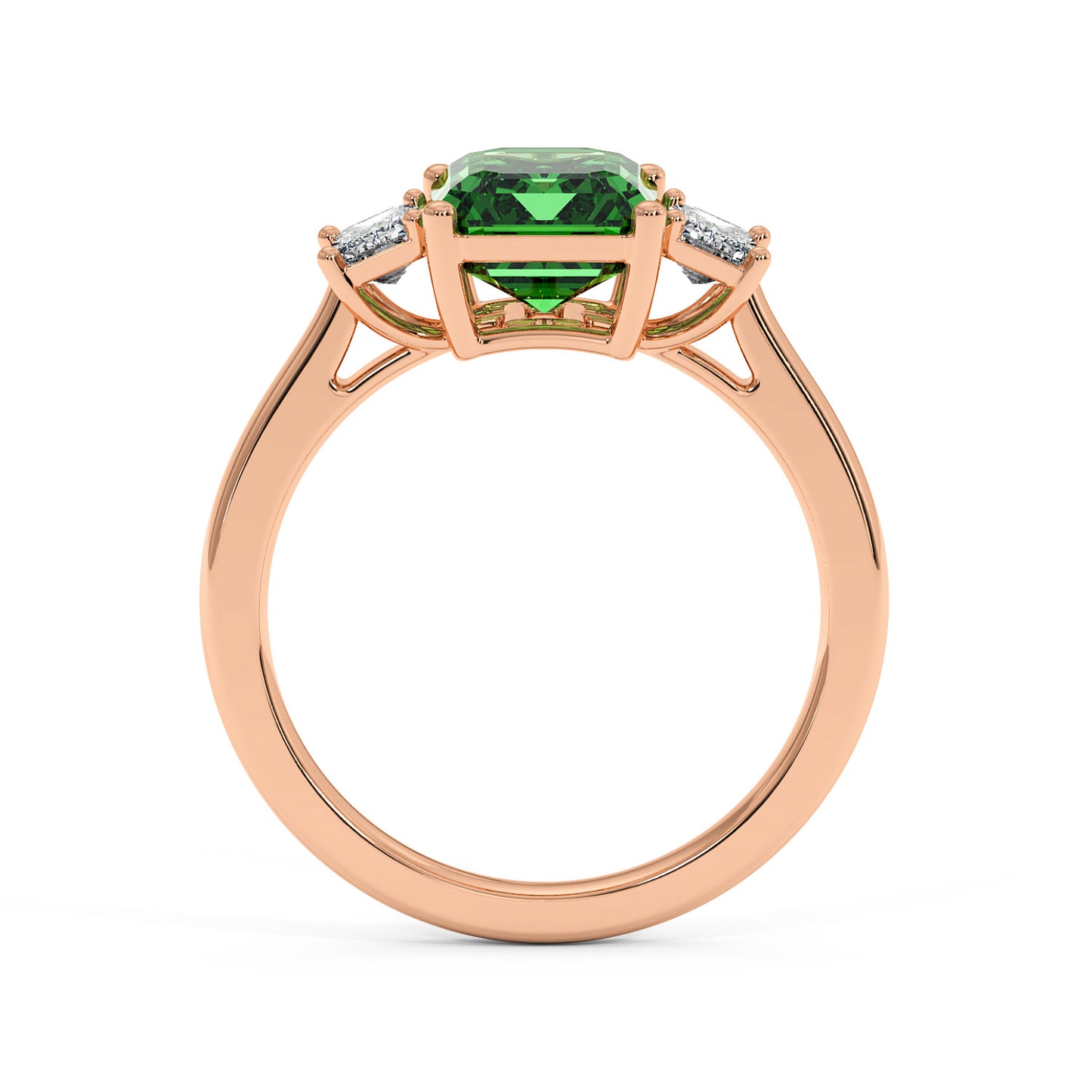 Rose gold 3.5 carat emerald cut ring with green gemstone in prong setting and two smaller diamonds.