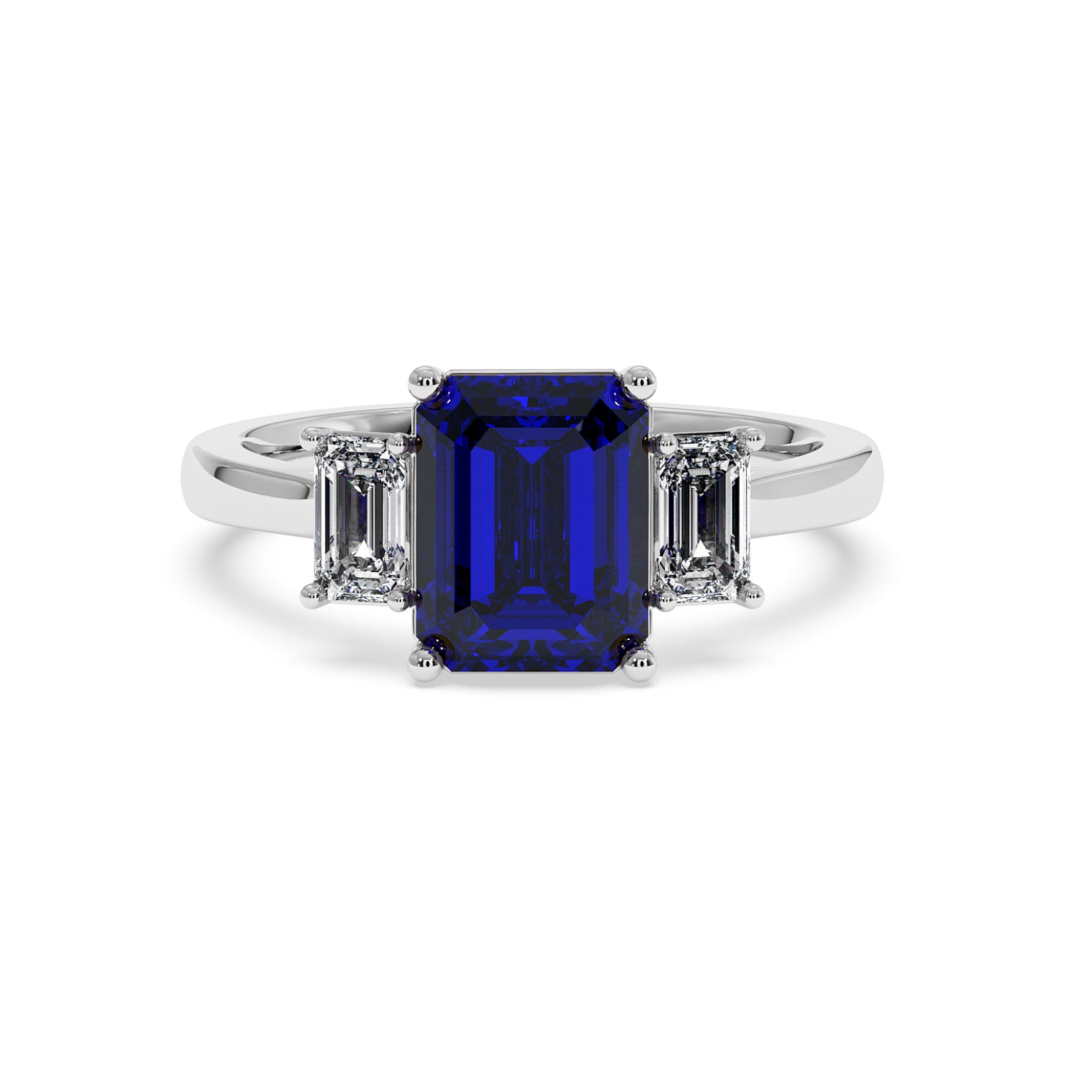 Luxurious 14k white gold 3.5 carat blue sapphire ring with emerald-cut center stone and two smaller rectangular diamonds.