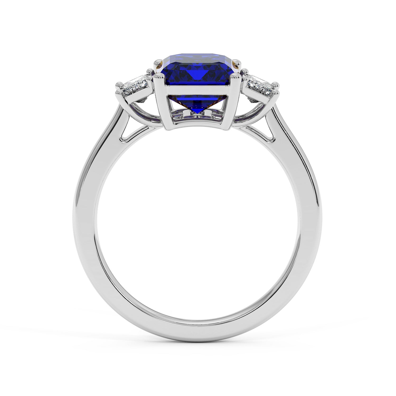 14k white gold 3.5 carat blue sapphire ring with large center gemstone and two smaller clear stones. Elegant design.