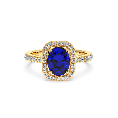 2.50CT oval blue sapphire in 14K gold ring with diamond halo and diamond-accented band