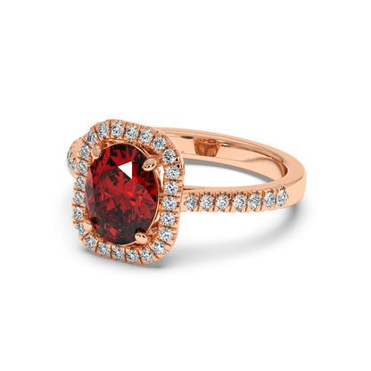 Rose gold ring with a radiant 2.50CT oval red ruby and a halo of sparkling diamonds, creating an elegant, luxurious look.