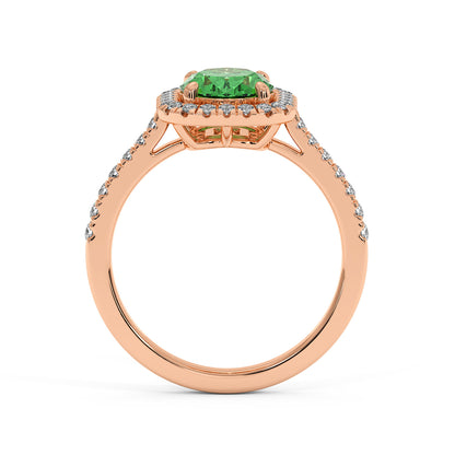Rose gold ring with a 2.50CT green YAG round center stone, encircled by small diamonds and a diamond-studded band for an elegant, luxurious look.