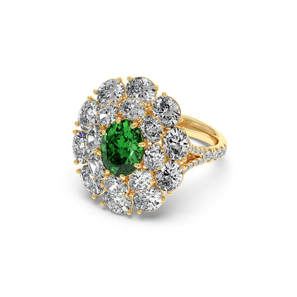 A 14k gold ring with a 2.50CT oval green YAG surrounded by a halo of sparkling white diamonds, exuding timeless elegance and luxury.