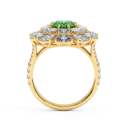A 14k gold ring featuring a 2.50CT oval green YAG center, surrounded by a halo of diamonds and a diamond-studded band, exuding luxury.