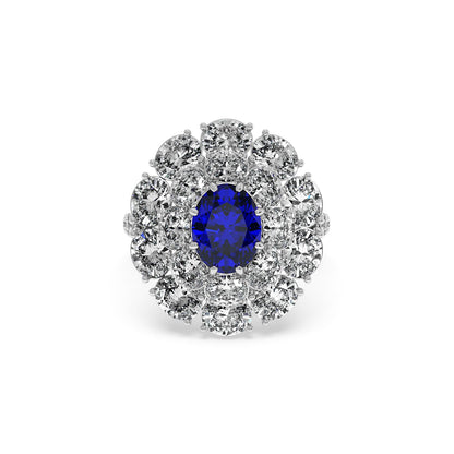 A 14k white gold ring with a 2.50CT oval blue sapphire surrounded by sparkling diamonds, creating an elegant and luxurious look.
