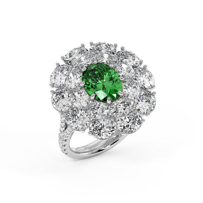 Top view of a 14k white gold ring with a 2.50CT oval green YAG surrounded by sparkling diamonds, exuding luxury and sophistication.