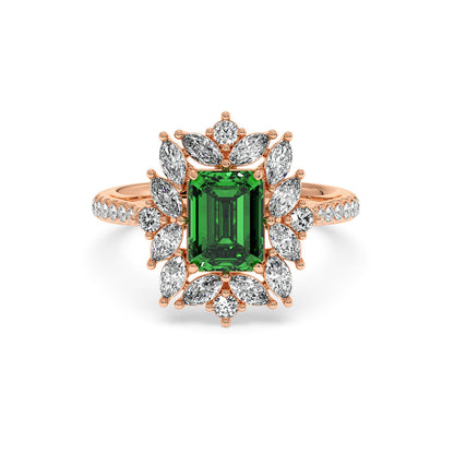 14k rose gold ring with a 2.25CT green YAG center surrounded by marquise and round diamonds, creating an elegant and luxurious design.