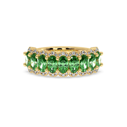 14k gold ring adorned with vibrant Green YAG oval gemstones, accented by small round diamonds.
