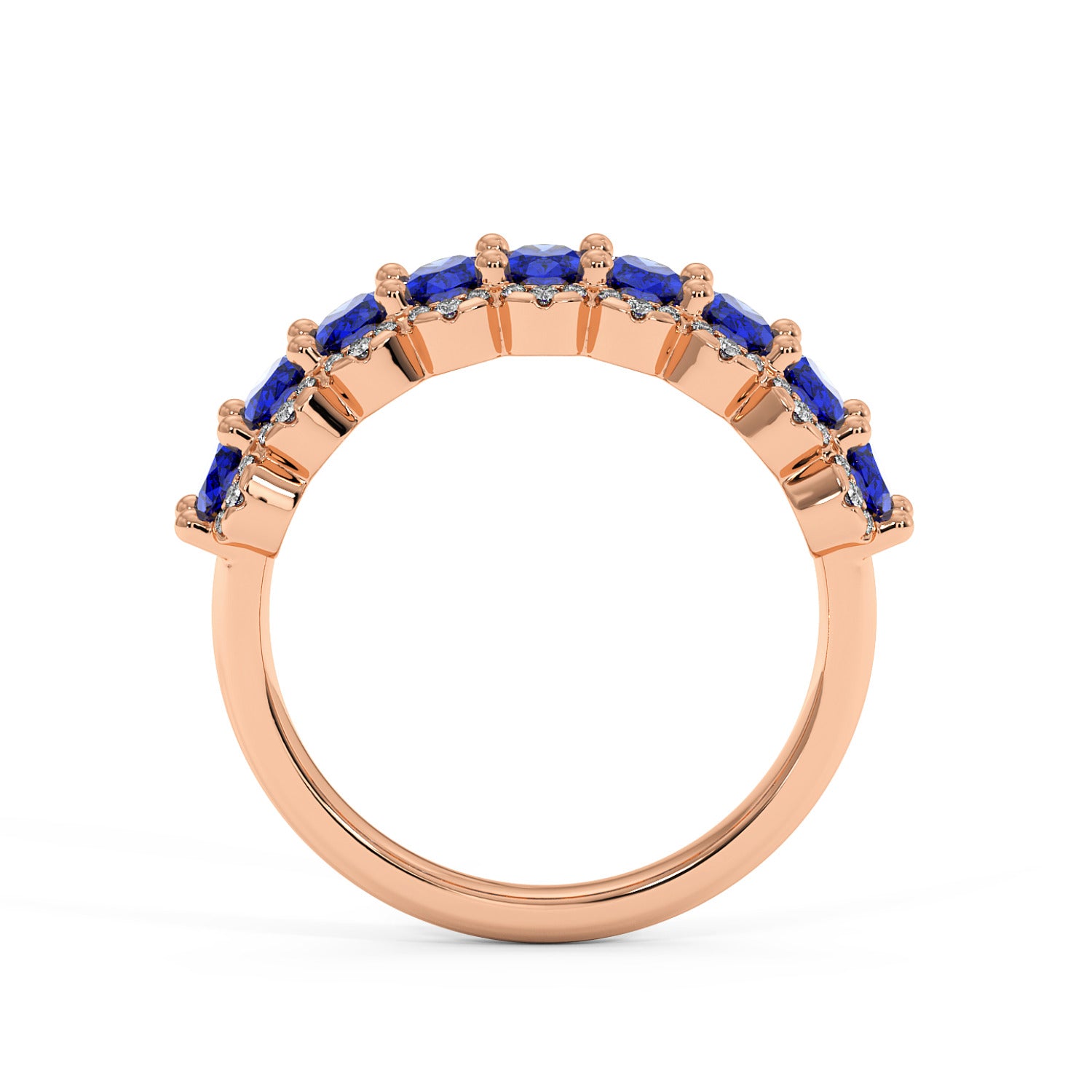 14k gold ring with a row of vivid Blue Sapphire gemstones set across the top in prongs, featuring a sleek, elegant design.