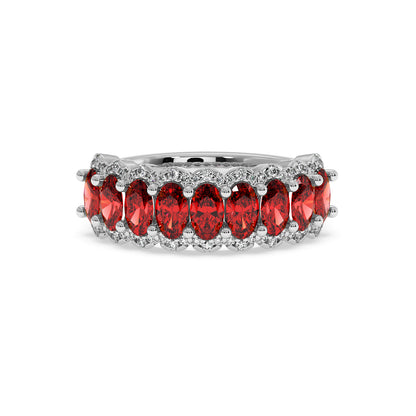 Elegant 14k white gold ring with bold Red Ruby oval stones surrounded by small diamonds in a symmetrical design.