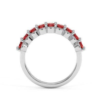 14k white gold ring with a half circle of Red Ruby gemstones adorning the top, featuring a sleek, elegant design.