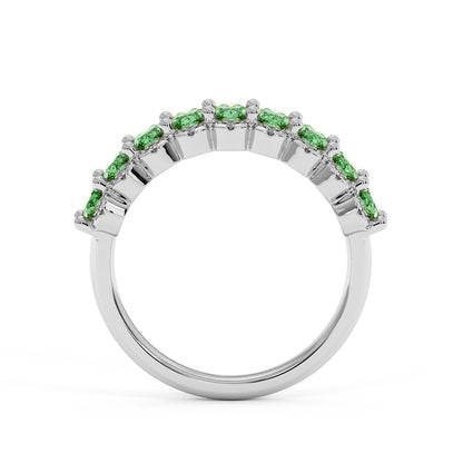 14k white gold ring with a row of small, bright Green YAG gemstones set along the top half in a sleek, elegant design.