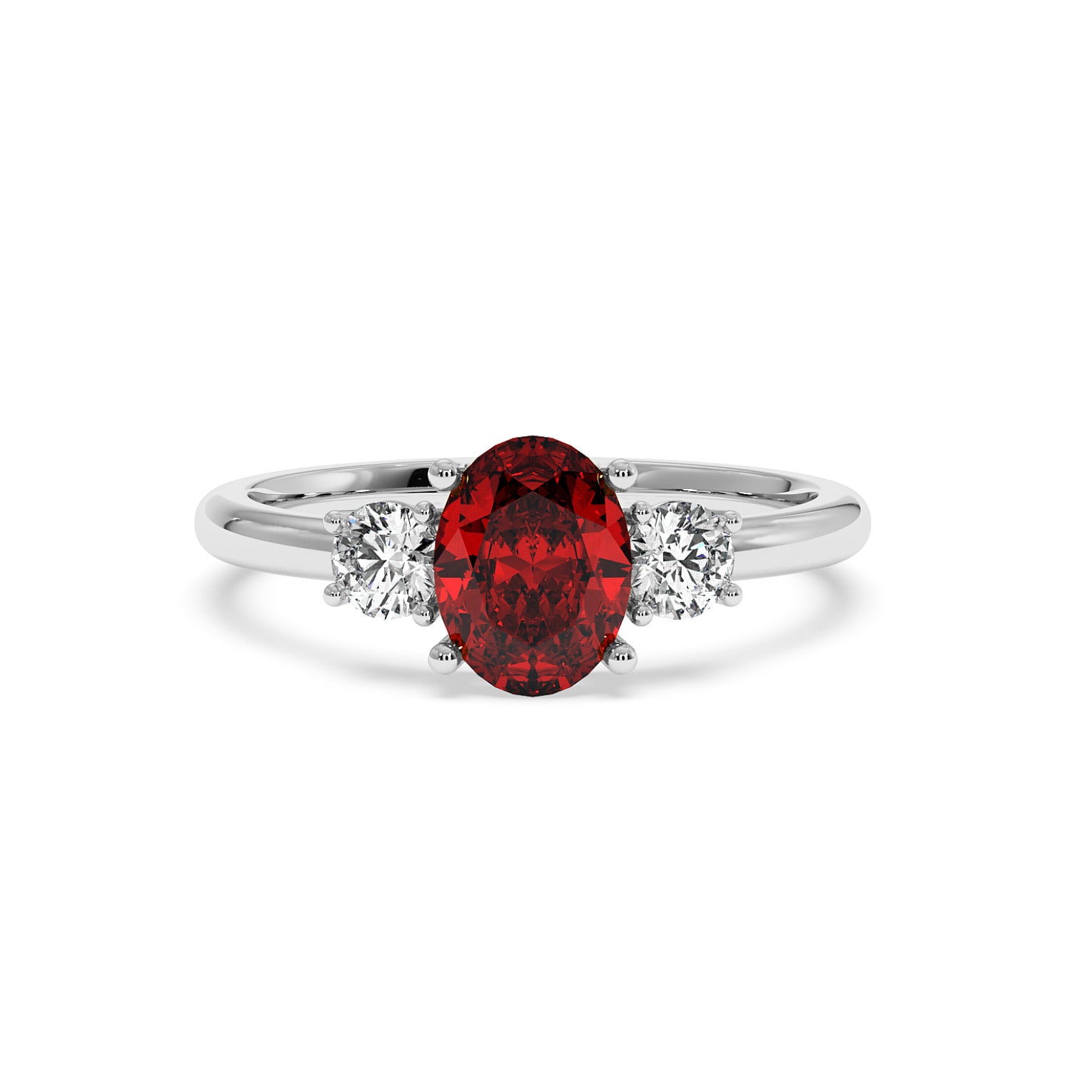 14k white gold oval ruby ring with red center gemstone flanked by two round white diamonds. Elegant, luxurious design.