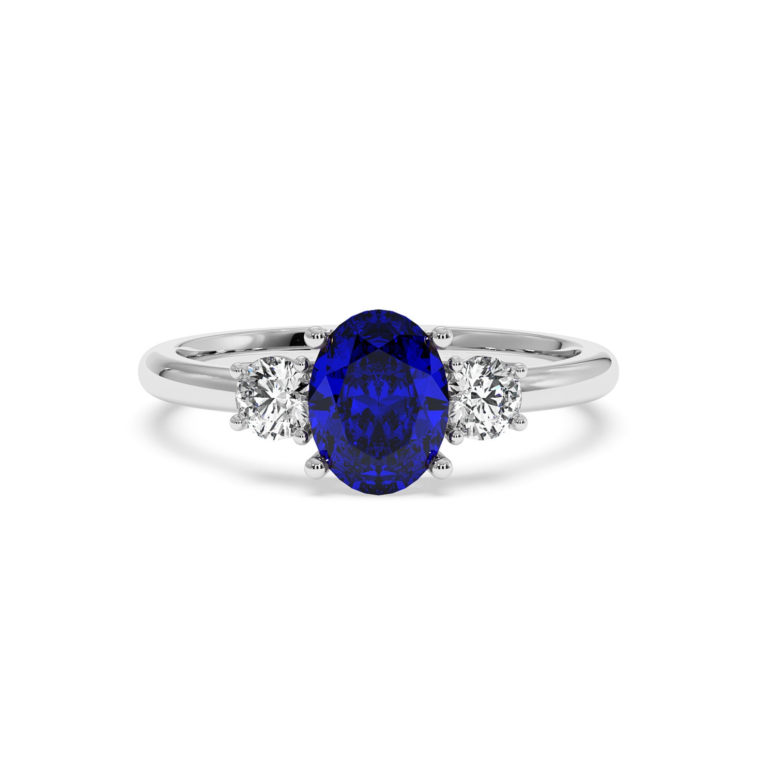 14k white gold ring with an oval blue sapphire center flanked by two round diamonds, creating an elegant, luxurious look.