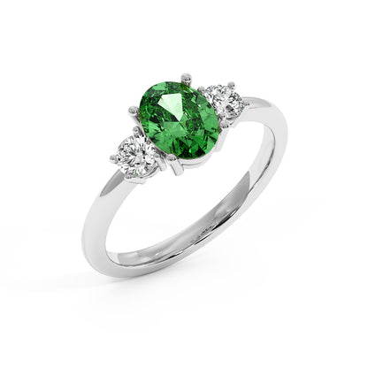Top view of 14k white gold 1.75CT Oval Green YAG ring with oval center gemstone and two small round diamonds.