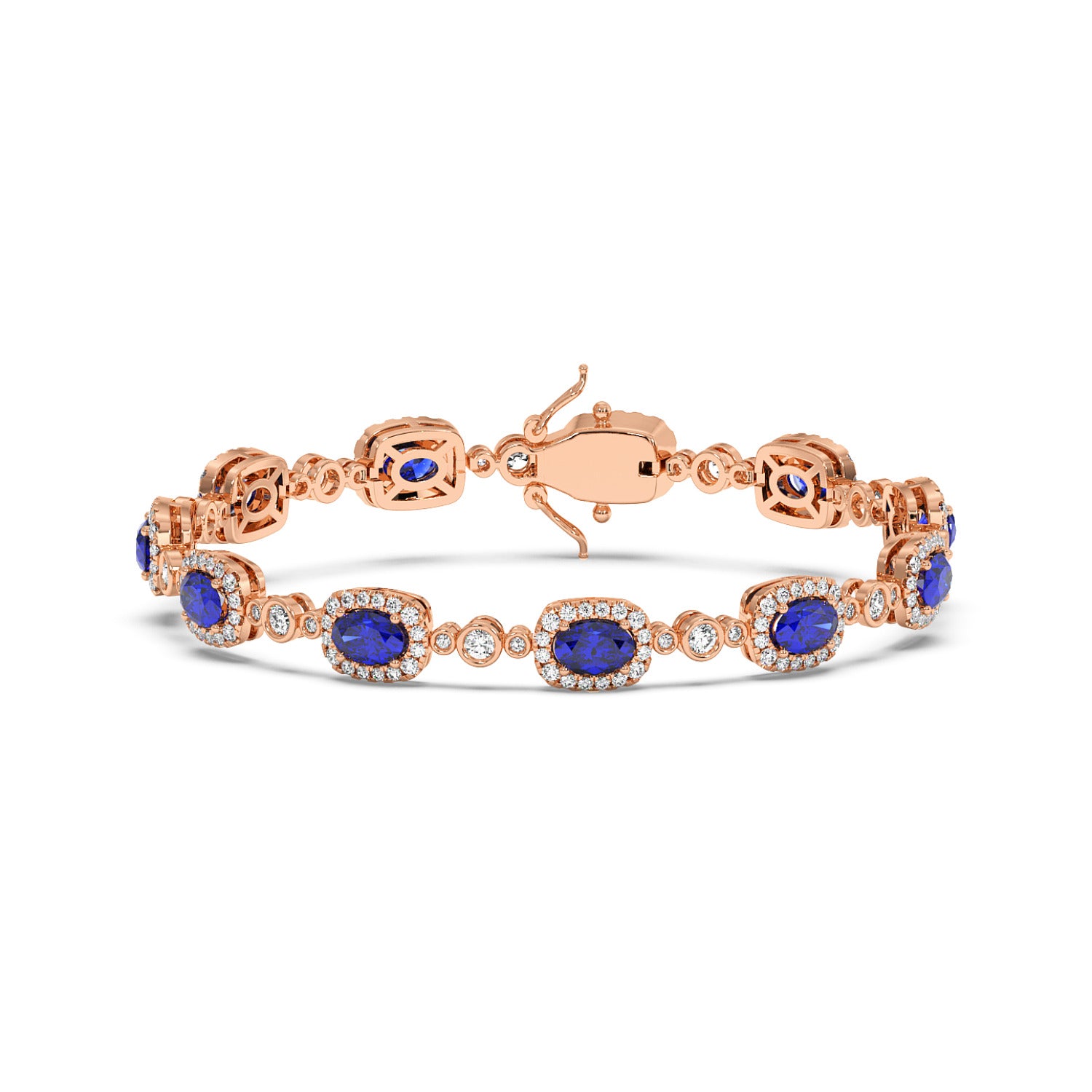 A 14k rose gold bracelet with oval blue sapphire gemstones surrounded by small white diamonds.