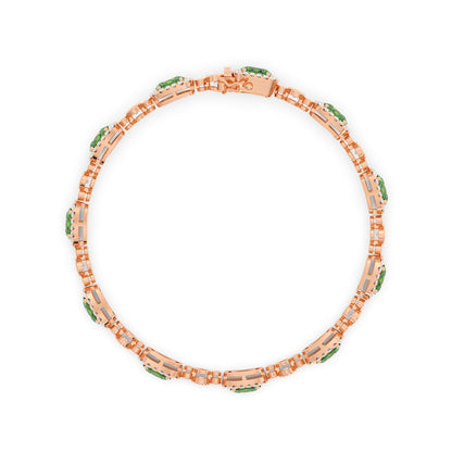 Elegant 14k rose gold bracelet with oval emerald gemstones surrounded by small diamonds.