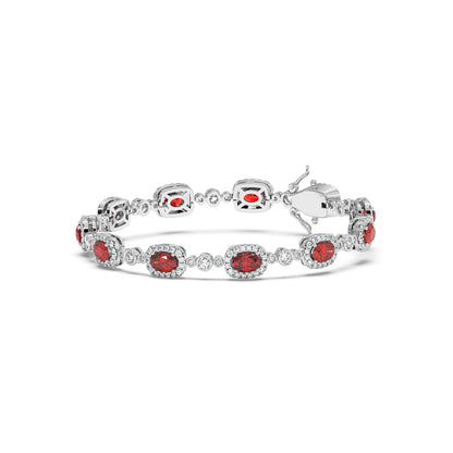 Elegant 14k white gold bracelet with oval ruby gemstones, each encircled by sparkling white stones.