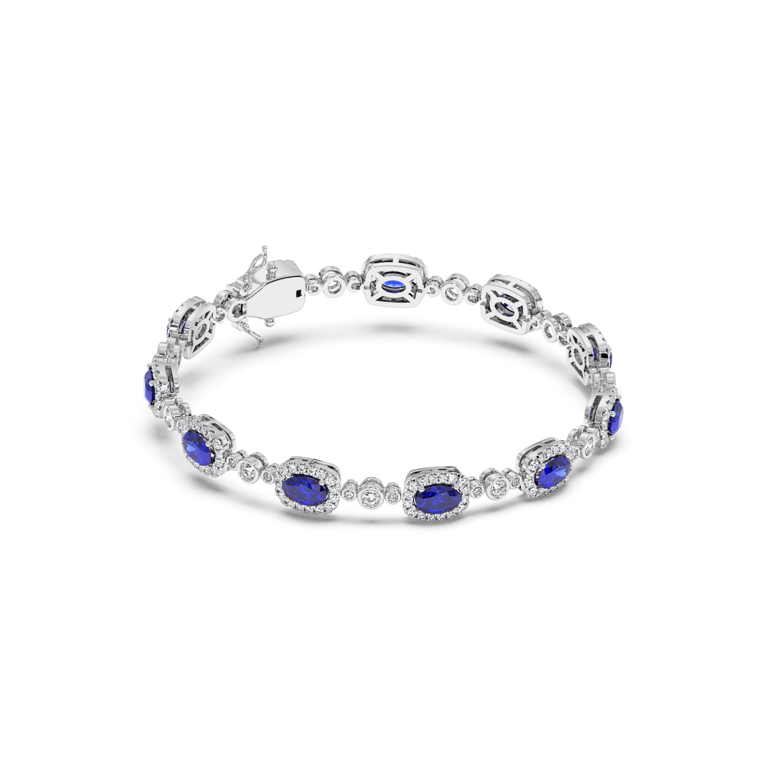 A 14k white gold bracelet featuring alternating oval blue sapphire gemstones and small round diamonds in an elegant pattern.