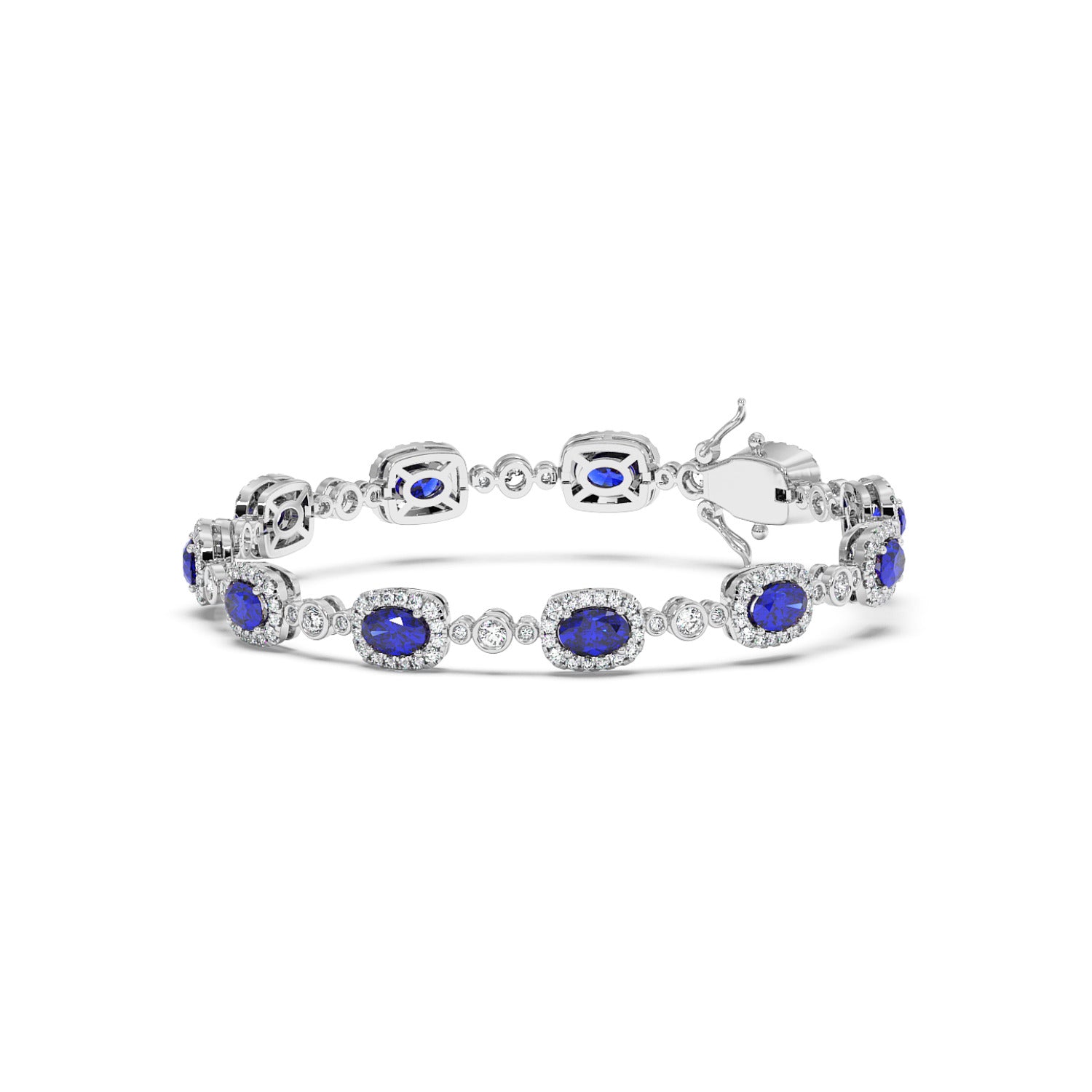Elegant 14k white gold bracelet featuring oval-cut blue sapphire gemstones encircled by sparkling white stones.