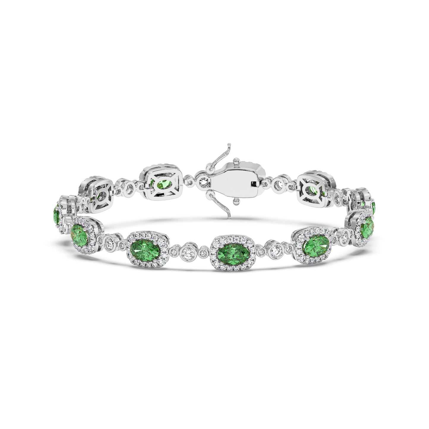 Elegant 14k white gold bracelet with sparkling oval emeralds surrounded by small clear stones.