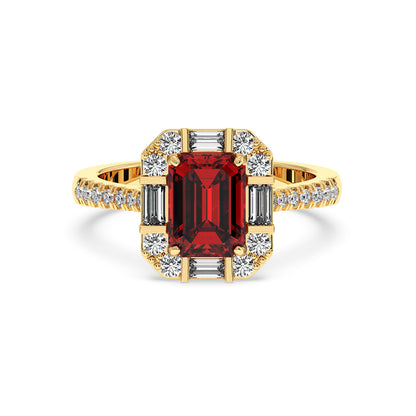 14k gold emerald ring with a central red emerald-cut stone, accented by baguette and round diamonds. Elegant and luxurious design.
