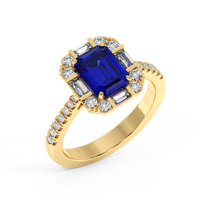 Top view of gold ring with a large blue sapphire center, surrounded by smaller diamonds, showcasing an elegant and luxurious design.