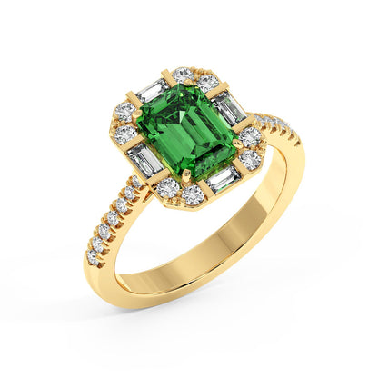 Top view of a gold ring with an emerald-cut green YAG surrounded by clear diamonds, band adorned with small diamonds