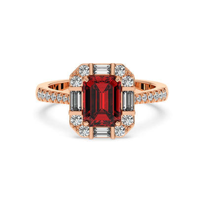 Rose gold emerald ring with an emerald-cut red ruby center framed by round and baguette diamonds, exuding elegance and luxury.