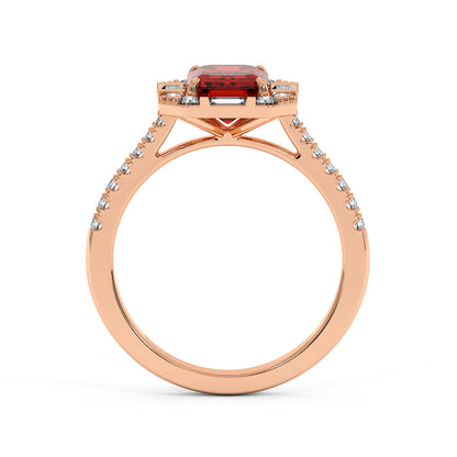Rose gold emerald engagement ring with a square red ruby center surrounded by small diamonds and accented band, exuding elegance.