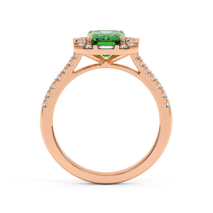 Rose gold ring with a vivid green YAG in a prong setting and a diamond-studded band, creating an elegant, luxurious look
