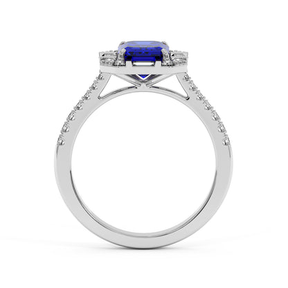 14k white gold ring with a large rectangular blue sapphire center bordered by small diamonds and a band adorned with tiny diamonds. Elegant and luxurious.