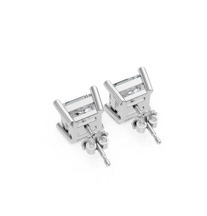 A pair of square silver earrings with butterfly backings displayed on a white background. They feature a sleek, modern design and a polished finish.