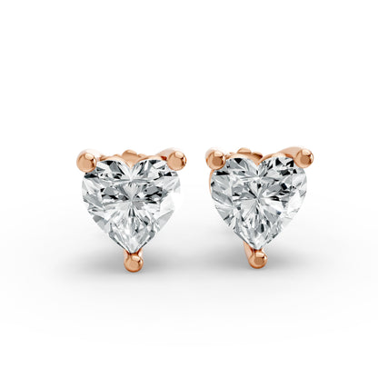 Rose gold plated heart-shaped stud earrings. The brilliant lab-grown diamonds sparkle, conveying an elegant and romantic look.