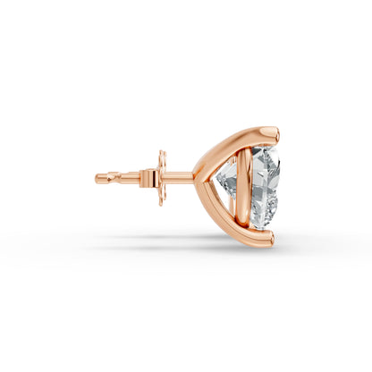 Close-up side view of a solitaire diamond stud earring set in rose gold plated silver, featuring a prong design.