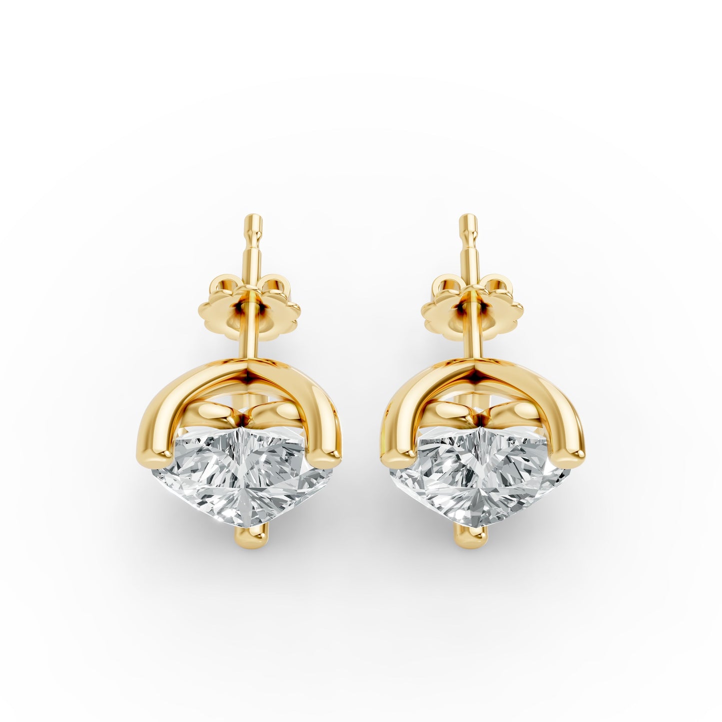 Elegant stud earrings featuring large, heart shape diamonds set in shiny gold plated prongs. Conveys luxury and sophistication.