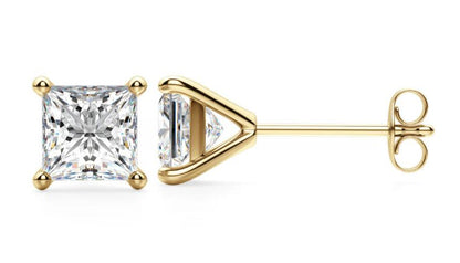 Pair of 14k gold stud earrings with square clear gemstones, shown in front and side views.